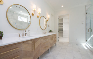 Master bathroom with dual sinks and mirrors