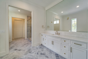 Master bathroom with large marble shower