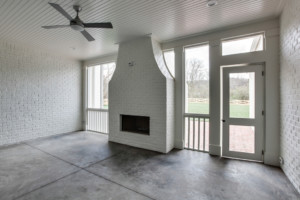 Enclosed porch with fireplace