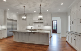 Marble countertops in custom built white kitchen