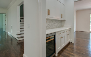 Wet bar area with cabinets