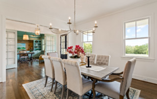 Dining room with velvet tan chairs
